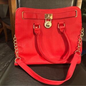 Elegant Red Handbag with Gold Accents